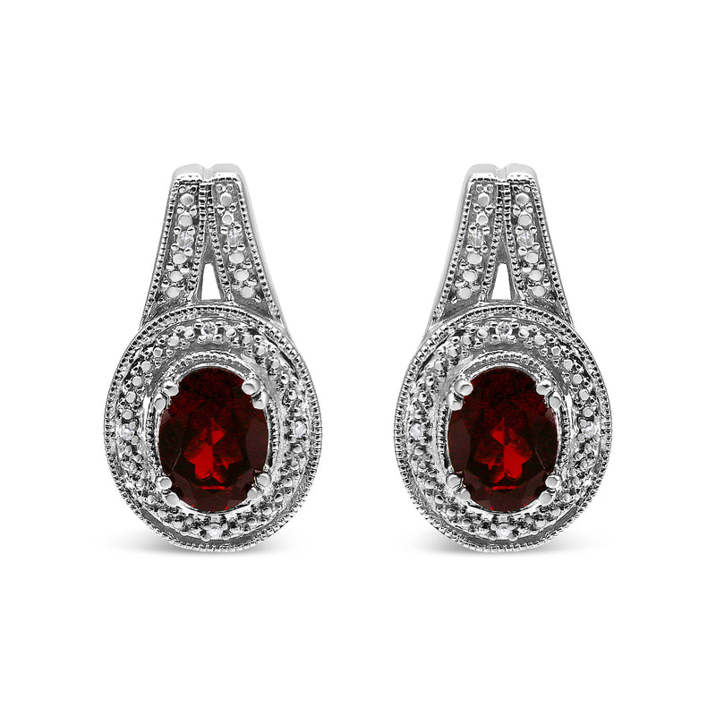Bids.com .925 Sterling Silver Diamond Accent and 8x6mm Red Oval Garnet Stud Earrings (I-J Color, I1-I2 Clarity) Earrings White Smoke White.Sterling Silver / 0.048