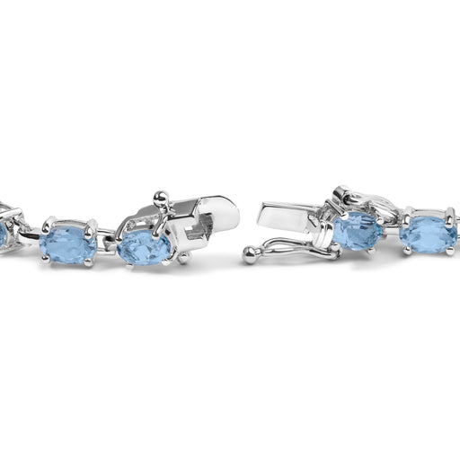 Bids.com .925 Sterling Silver 11.0 Cttw Oval Shaped Created Light Blue Topaz Link Bracelet - 7 inch Bracelets White Smoke White.Sterling Silver / 7
