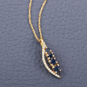 Bids.com 0.40 Carat Genuine Blue Sapphire and White Diamond 14K Yellow Gold Pendant Pendants Slate Gray