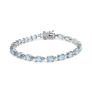 Bids.com .925 Sterling Silver 11.0 Cttw Oval Shaped Created Light Blue Topaz Link Bracelet - 7 inch Bracelets White Smoke White.Sterling Silver / 7