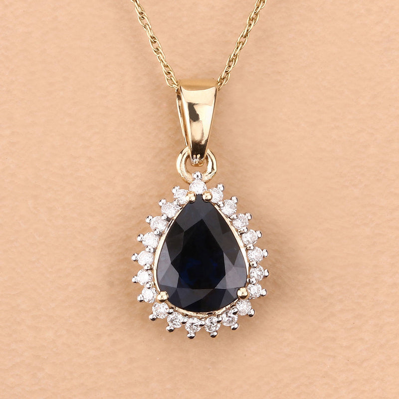 Bids.com 2.09 Carat Genuine Blue Sapphire and White Diamond 14K Yellow Gold Pendant Pendants Tan
