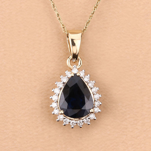 Bids.com 2.09 Carat Genuine Blue Sapphire and White Diamond 14K Yellow Gold Pendant Pendants Tan