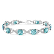 Bids.com .925 Sterling Silver 7x7 mm Cushion Cut Blue Topaz and 1/20 cttw Round Cut Diamond Fashion Tennis Bracelet (I-J Color, I1-I2 Clarity) - 7" Bracelets White Smoke White.Sterling Silver / 7