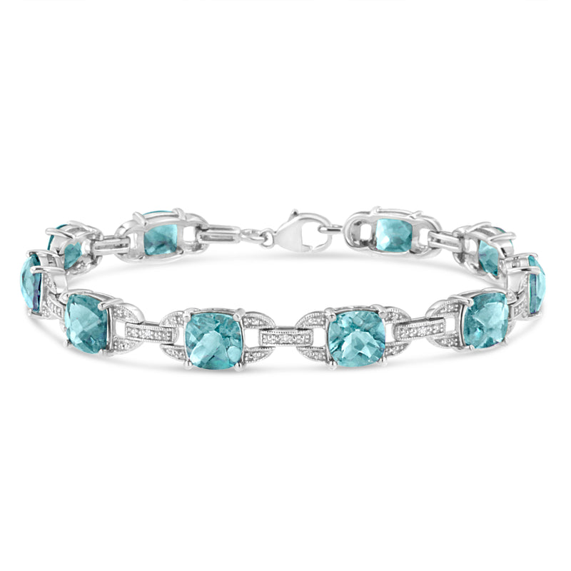 Bids.com .925 Sterling Silver 7x7 mm Cushion Cut Blue Topaz and 1/20 cttw Round Cut Diamond Fashion Tennis Bracelet (I-J Color, I1-I2 Clarity) - 7" Bracelets White Smoke White.Sterling Silver / 7