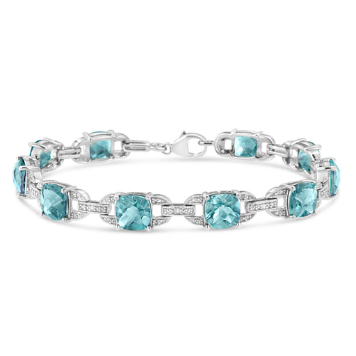 Bids.com .925 Sterling Silver 7x7 mm Cushion Cut Blue Topaz and 1/20 cttw Round Cut Diamond Fashion Tennis Bracelet (I-J Color, I1-I2 Clarity) - 7" Bracelets White Smoke White.Sterling Silver / 7