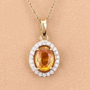 Bids.com 1.78 Carat Genuine Yellow Sapphire and White Diamond 14K Yellow Gold Pendant Pendants Tan