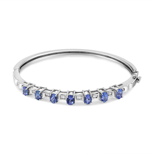 Bids.com 14K White Gold 5 MM Oval Blue Tanzanite and 1/4 Cttw Diamond Bangle (H-I Color, VS2-SI1 Clarity) - Fits wrists up to 7 1/2 Inches Bracelets White Smoke White.Gold / 7