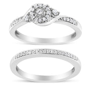 Bids.com .925 Sterling Silver 1/4 Cttw Diamond Halo and Swirl Engagement Ring and Wedding Band Set (I-J Color, I3 Clarity)- Ring Size 7 Rings White Smoke 7 / White.Sterling Silver,6 / White.Sterling Silver,8 / White.Sterling Silver,5 / White.Sterling Silver,9 / White.Sterling Silver