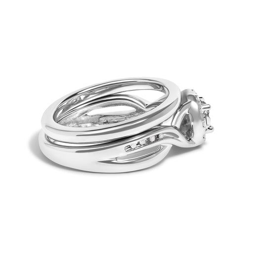 Bids.com .925 Sterling Silver 1/7 Cttw Diamond Halo Bypass Engagement Ring and Wedding Band Set (I-J Color, I3 Clarity)- Size 7 Rings White Smoke 7 / White.Sterling Silver,5 / White.Sterling Silver,6 / White.Sterling Silver,8 / White.Sterling Silver,9 / White.Sterling Silver,10 / White.Sterling Silver,11 / White.Sterling Silver,12 / White.Sterling Silver
