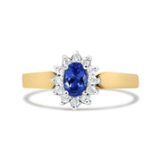 Bids.com 14K Yellow Gold 1/5 Cttw Round Diamond and 6x4mm Oval Blue Tanzanite Halo Ring (H-I Color, I1-I2 Clarity) - Size 7.75 Rings White Smoke 7.75 / Yellow.Gold