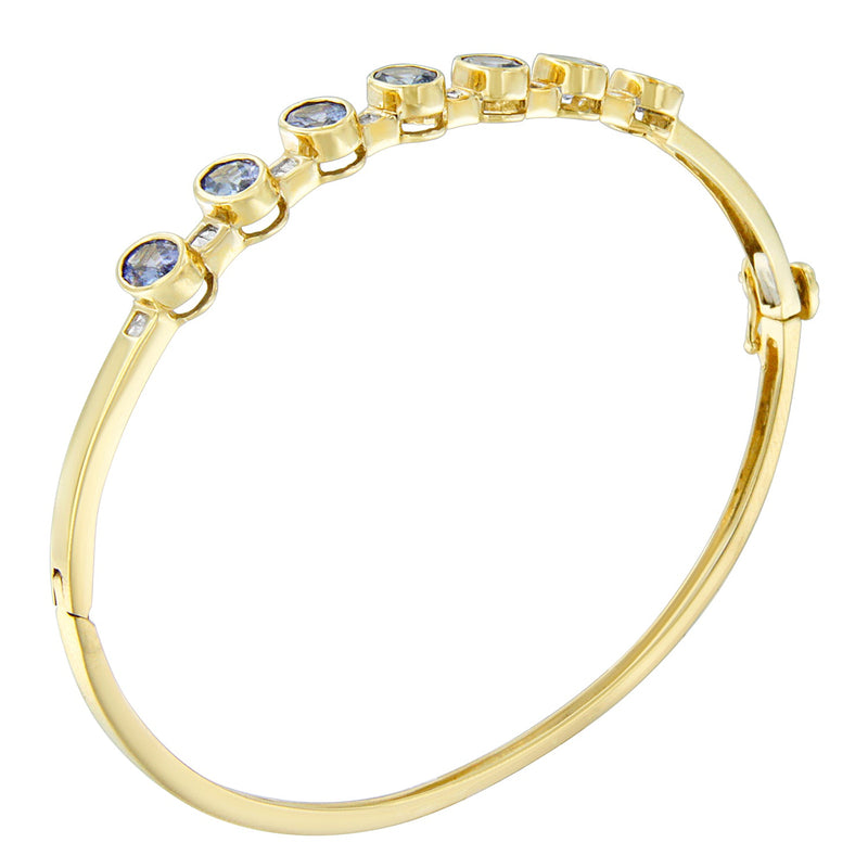 Bids.com 14K Yellow Gold Alternating Bezel Set 5MM Oval Shaped Tanzanite and 1/5 Cttw Diamond Bangle Bracelet (H-I Color, VS2-SI1 Clarity) - Fit's wrists up to 7.25" Inches Bracelets White Smoke Yellow.Gold / 7