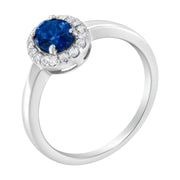 Bids.com 10K White Gold 1/5 Cttw Round Diamond and Prong Set 7MM Created Blue Sapphire Halo Cocktail Ring (H-I Color, I1-I2 Clarity) - Size 7 Rings White Smoke 7 / White.Gold
