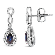 Bids.com 10K White Gold Pear Cut Blue Sapphire and 1/7 Cttw Diamond Infinity Drop and Dangle Earrings (I-J Color, I1-I2 Clarity) Earrings White Smoke White.Gold / 0.14