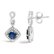 Bids.com 10K White Gold Blue  Sapphire and Diamond Halo Cushion Shaped Drop Earrings (I-J Color, I1-I2 Clarity) Earrings White Smoke White.Gold / 0.187