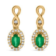 Bids.com 10K Yellow Gold Oval Cut Green Emerald 5x3 mm and 1/7 Cttw Round Diamond Dangle Earrings Earrings White Smoke Yellow.Gold / 0.164