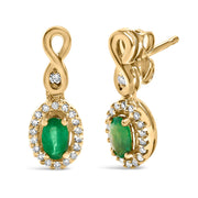 Bids.com 10K Yellow Gold Oval Cut Green Emerald 5x3 mm and 1/7 Cttw Round Diamond Dangle Earrings Earrings White Smoke Yellow.Gold / 0.164