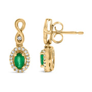 Bids.com 10K Yellow Gold Oval Cut Green Emerald 5x3 mm and 1/7 Cttw Round Diamond Dangle Earrings Earrings White Smoke Yellow.Gold / 0.164