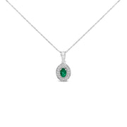 Bids.com 14K White Gold Oval 6x4 MM Green Emerald and Diamond Halo Pendant Necklace - 18 inch Necklaces White Smoke White.Gold / 18