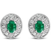 Bids.com 14K White Gold Oval Green Emerald and 1/10 Cttw Diamond Halo Stud Earrings  (I-J Color, I1-I2 Clarity) Earrings White Smoke White.Gold / 0.102