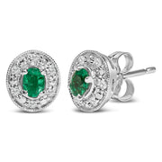 Bids.com 14K White Gold Oval Green Emerald and 1/10 Cttw Diamond Halo Stud Earrings  (I-J Color, I1-I2 Clarity) Earrings White Smoke White.Gold / 0.102