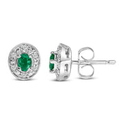 Bids.com 14K White Gold Oval Green Emerald and 1/10 Cttw Diamond Halo Stud Earrings  (I-J Color, I1-I2 Clarity) Earrings White Smoke White.Gold / 0.102