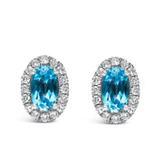 Bids.com 10K White Gold 5x3 MM Oval Purple Amethyst and Diamond Halo Stud Earrings (I-J Color, I1-I2 Clarity) Earrings White Smoke White.Gold / 0.144 / Blue Topaz