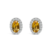 Bids.com 10K White Gold 5x3 MM Oval Purple Amethyst and Diamond Halo Stud Earrings (I-J Color, I1-I2 Clarity) Earrings White Smoke White.Gold / 0.144 / Yellow Citrine