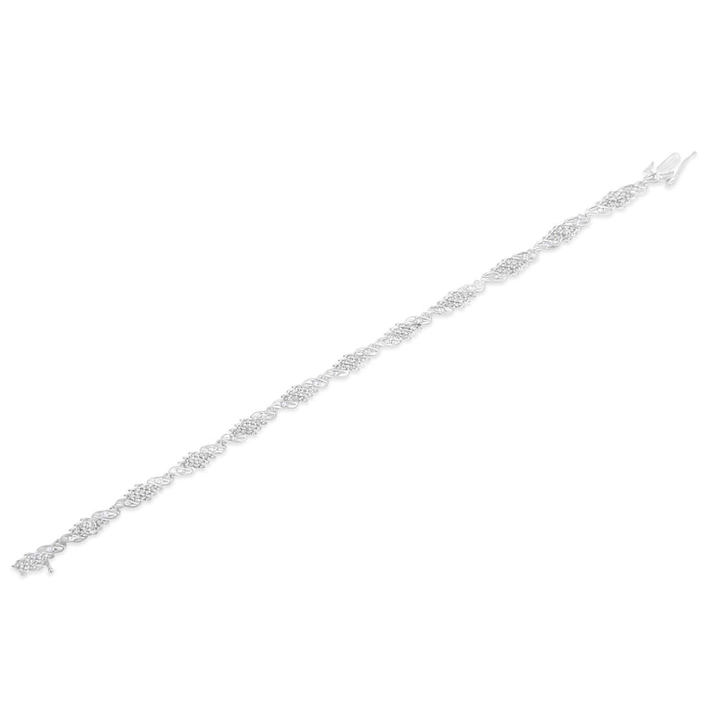 Bids.com .925 Sterling Silver 1-1/2 Cttw Round and Baguette Cut Diamond Wave Link Bracelet (I-J Color, I2-I3 Clarity) - 7" Bracelets White Smoke White.Sterling Silver / 7.25