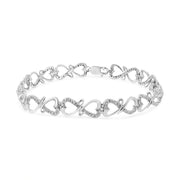 Bids.com .925 Sterling Silver 1/3 Cttw Round-Cut Diamond Double Heart Infinity Link 7.25" Bracelet (H-I Color, I3 Clarity) Bracelets White Smoke White.Sterling Silver / 7.25