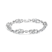 Bids.com .925 Sterling Silver 1.0 Cttw Diamond Infinity Loop and Swirl Link Bracelet (I-J Color, I2-I3 Clarity) - 7.25" Inches Bracelets White Smoke White.Sterling Silver / 7.25