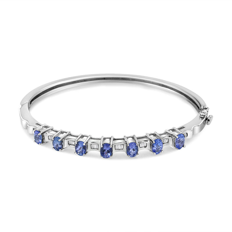 Bids.com 14K White Gold 5 MM Oval Blue Tanzanite and 1/4 Cttw Diamond Bangle (H-I Color, VS2-SI1 Clarity) - Fits wrists up to 7 1/2 Inches Bracelets White Smoke White.Gold / 7