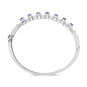 Bids.com 14K White Gold 5 MM Oval Blue Tanzanite and 1/4 Cttw Diamond Bangle (H-I Color, VS2-SI1 Clarity) - Fits wrists up to 7 1/2 Inches Bracelets White Smoke White.Gold / 7