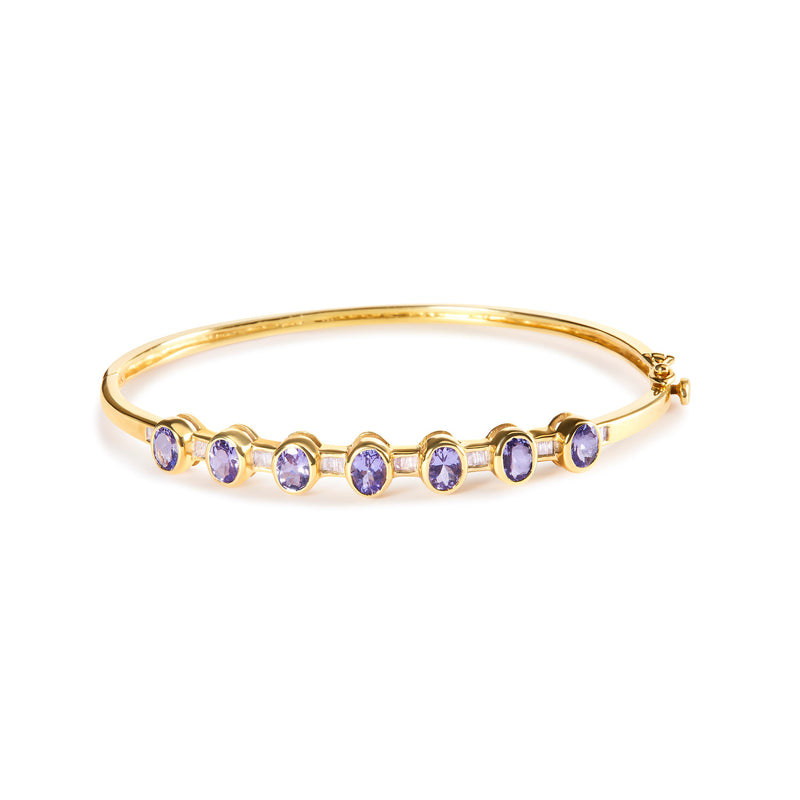 Bids.com 14K Yellow Gold Alternating Bezel Set 5MM Oval Shaped Tanzanite and 1/5 Cttw Diamond Bangle Bracelet (H-I Color, VS2-SI1 Clarity) - Fit's wrists up to 7.25" Inches Bracelets White Smoke Yellow.Gold / 7
