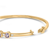 Bids.com 14K Yellow Gold Alternating Bezel Set 5MM Oval Shaped Tanzanite and 1/5 Cttw Diamond Bangle Bracelet (H-I Color, VS2-SI1 Clarity) - Fit's wrists up to 7.25" Inches Bracelets White Smoke Yellow.Gold / 7