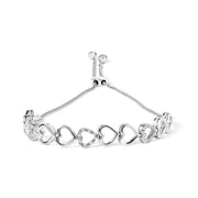 Bids.com .925 Sterling Silver 1/10 Cttw Diamond Heart Link Bolo Bracelet (I-J Color, I2-I3 Clarity) Bracelets White Smoke White.Sterling Silver / 7