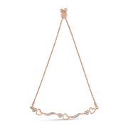 Bids.com 14K Rose Gold Plated .925 Sterling Silver 1/10 Cttw Diamond Wave and Hearts 4â€-10â€ Adjustable Bolo Bracelet (I-J Color, I3 Clarity) Bracelets White Smoke Rose.Sterling Silver / 7
