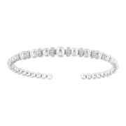 Bids.com .925 Sterling Silver 1/4 Cttw Diamond Rondelle Graduated Ball Bead Cuff Bangle Bracelet (I-J color, I2-I3 clarity) - Fits wrists up to 7 1/2 inches Bracelets White Smoke White.Sterling Silver / 7