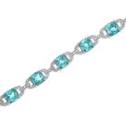Bids.com .925 Sterling Silver 7x7 mm Cushion Cut Blue Topaz and 1/20 cttw Round Cut Diamond Fashion Tennis Bracelet (I-J Color, I1-I2 Clarity) - 7" Bracelets White Smoke White.Sterling Silver / 7