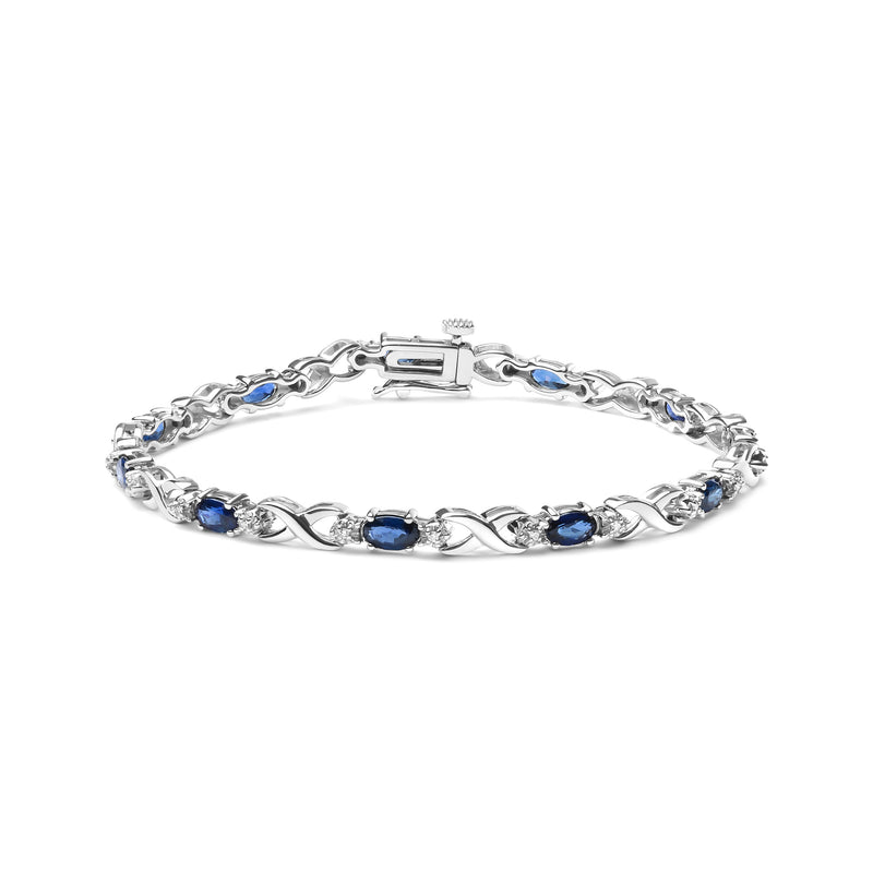 Bids.com 10K White Gold 5x4mm Oval Sapphire Gemstone and 1/10 Cttw Diamond Prong Set "X" Link Bracelet - Size 7" (H-I Color, SI1-SI2 Clarity) Bracelets White Smoke White.Gold / 7