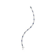 Bids.com 10K White Gold 5x4mm Oval Sapphire Gemstone and 1/10 Cttw Diamond Prong Set "X" Link Bracelet - Size 7" (H-I Color, SI1-SI2 Clarity) Bracelets White Smoke White.Gold / 7
