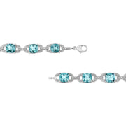 Bids.com .925 Sterling Silver 7x7 mm Cushion Cut Blue Topaz and 1/20 cttw Round Cut Diamond Fashion Tennis Bracelet (I-J Color, I1-I2 Clarity) - 7" Bracelets White Smoke White.Sterling Silver / 7