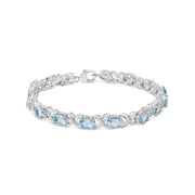 Bids.com .925 Sterling Silver 16.0 Cttw Oval Blue Topaz and Diamond Accent Tennis X Link Bracelet (I-J Color, I1-I2 Clarity) - Size 7" Inch Bracelets White Smoke White.Sterling Silver / 7