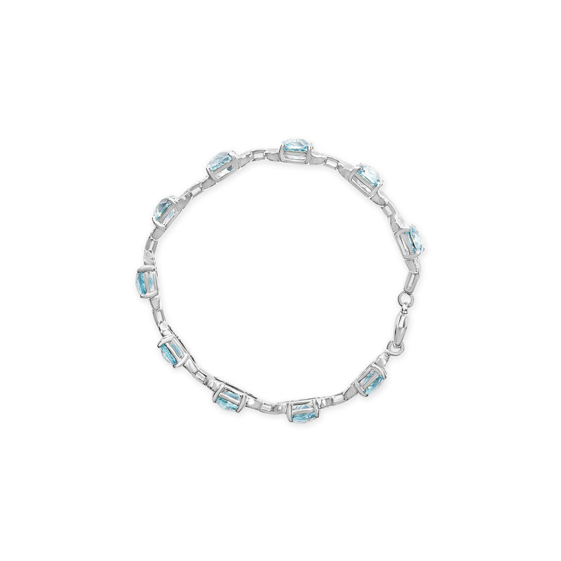 Bids.com .925 Sterling Silver 7x7 mm Cushion Cut Blue Topaz and 1/20 cttw Round Cut Diamond Fashion Tennis Bracelet (I-J Color, I1-I2 Clarity) - 7" Bracelets White Smoke White.Sterling Silver / 7