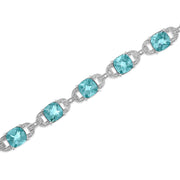 Bids.com .925 Sterling Silver 7x7 mm Cushion Cut Blue Topaz and 1/20 cttw Round Cut Diamond Fashion Tennis Bracelet (I-J Color, I1-I2 Clarity) - 7" Bracelets White Smoke White.Sterling Silver / 7
