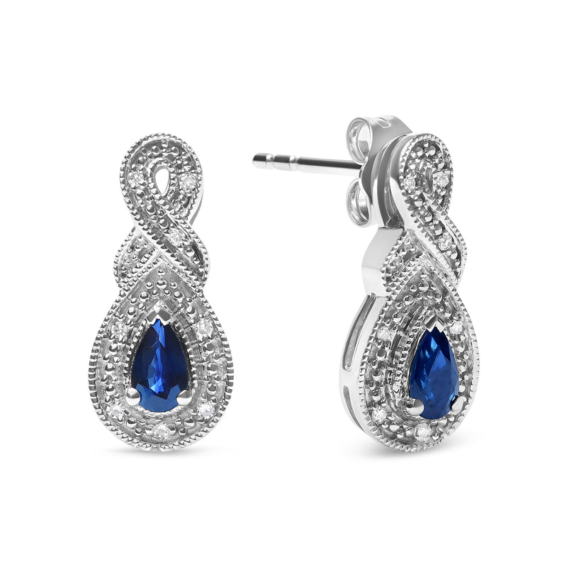 Bids.com .925 Sterling Silver 4.5 x 3mm Pear Sapphire Gemstone and Diamond Accent Infinity Drop Stud Earrings (H-I Color, SI1-SI2 Clarity) Earrings White Smoke White.Sterling Silver / 0.05