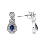 Bids.com .925 Sterling Silver 4.5 x 3mm Pear Sapphire Gemstone and Diamond Accent Infinity Drop Stud Earrings (H-I Color, SI1-SI2 Clarity) Earrings White Smoke White.Sterling Silver / 0.05