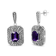 Bids.com .925 Sterling Silver Diamond Accent and 7x5mm Purple Amethyst Stud Earrings (I-J Color, I2-I3 Clarity) Earrings White Smoke White.Sterling Silver / 0.05