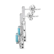 Bids.com .925 Sterling Silver 7x5MM Emerald Shape Blue Topaz and Diamond Accent Art Deco Halo Style Drop and Dangle Earrings (I-J Color, I1-I2 Clarity) Earrings White Smoke White.Sterling Silver / 0.04