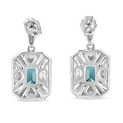 Bids.com .925 Sterling Silver 7x5MM Emerald Shape Blue Topaz and Diamond Accent Art Deco Halo Style Drop and Dangle Earrings (I-J Color, I1-I2 Clarity) Earrings White Smoke White.Sterling Silver / 0.04