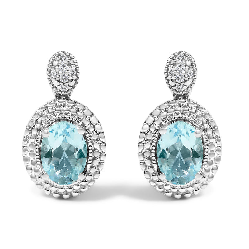 Bids.com .925 Sterling Silver Diamond Accent and  Oval Blue Topaz with Beaded Halo Drop Stud Earrings (I-J color, I1-I2 Clarity) Earrings White Smoke White.Sterling Silver / 0.044